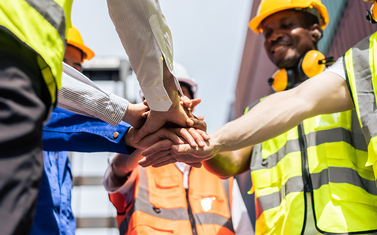 Team joining hands